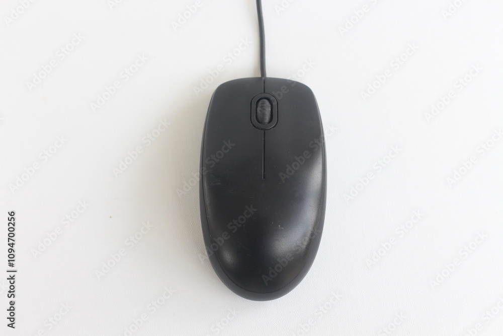 Top view of black computer mouse isolated on white background Top view of black computer mouse isolated on white background