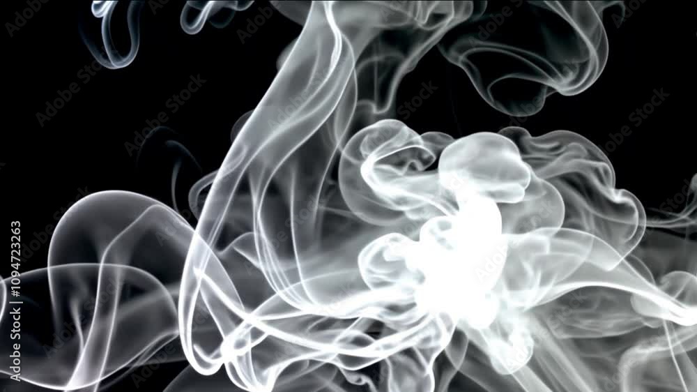 Luxurious blue smoke swirling and glowing on a pitch-black background.