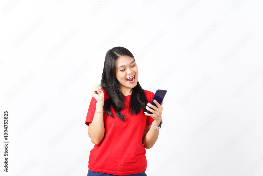 beautiful Asian woman smiles joyfully, holding a smartphone and discount voucher, thrilled about a discount beautiful Asian woman smiles joyfully, holding a smartphone and discount voucher, thrilled about a discount