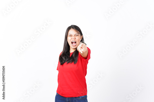 beautiful Asian woman screams with excitement, pointing forward in an expressive pose against a white background