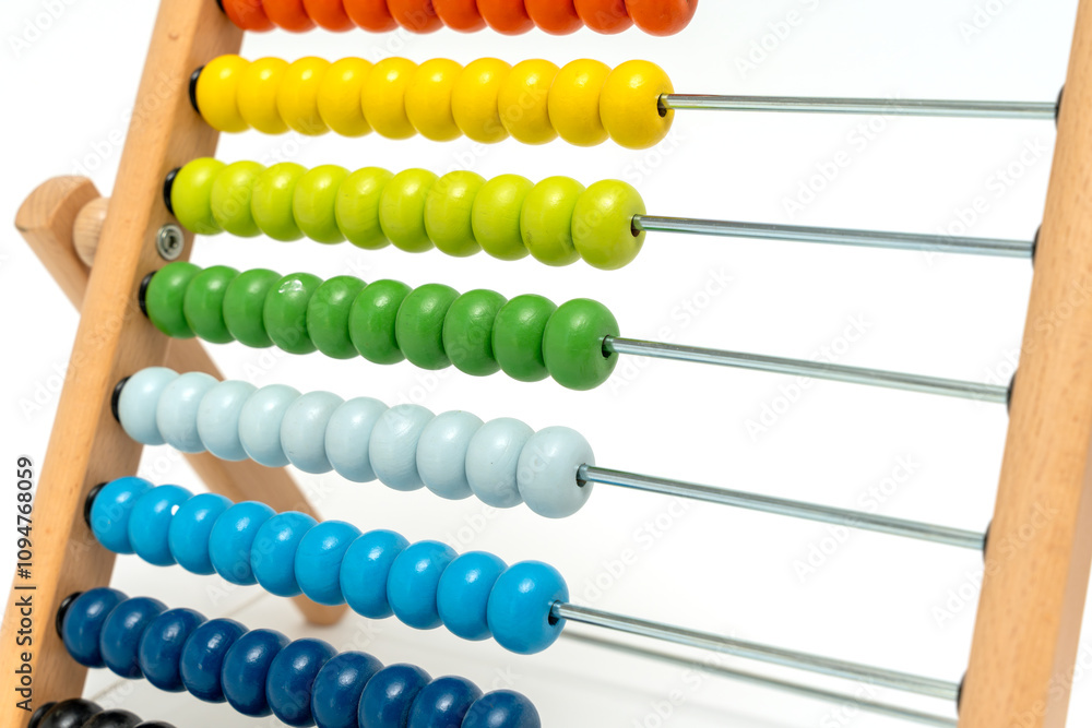 A wooden abacus with colorful beads on it. The beads are arranged in rows, with each row having a different color. The abacus is a simple yet effective tool for teaching children basic math concepts A wooden abacus with colorful beads on it. The beads are arranged in rows, with each row having a different color. The abacus is a simple yet effective tool for teaching children basic math concepts