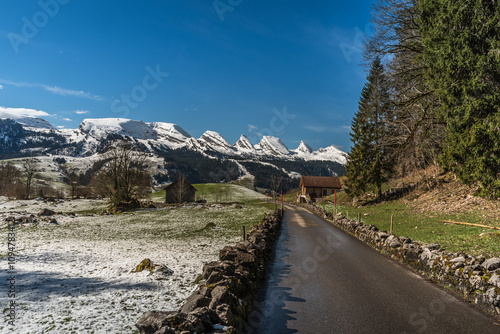 View of the snow-covered Churfirsten mountains in the Swiss Alps, Toggenburg, Wildhaus-Alt St Johann, Canton of St. Gallen, Switzerland photo