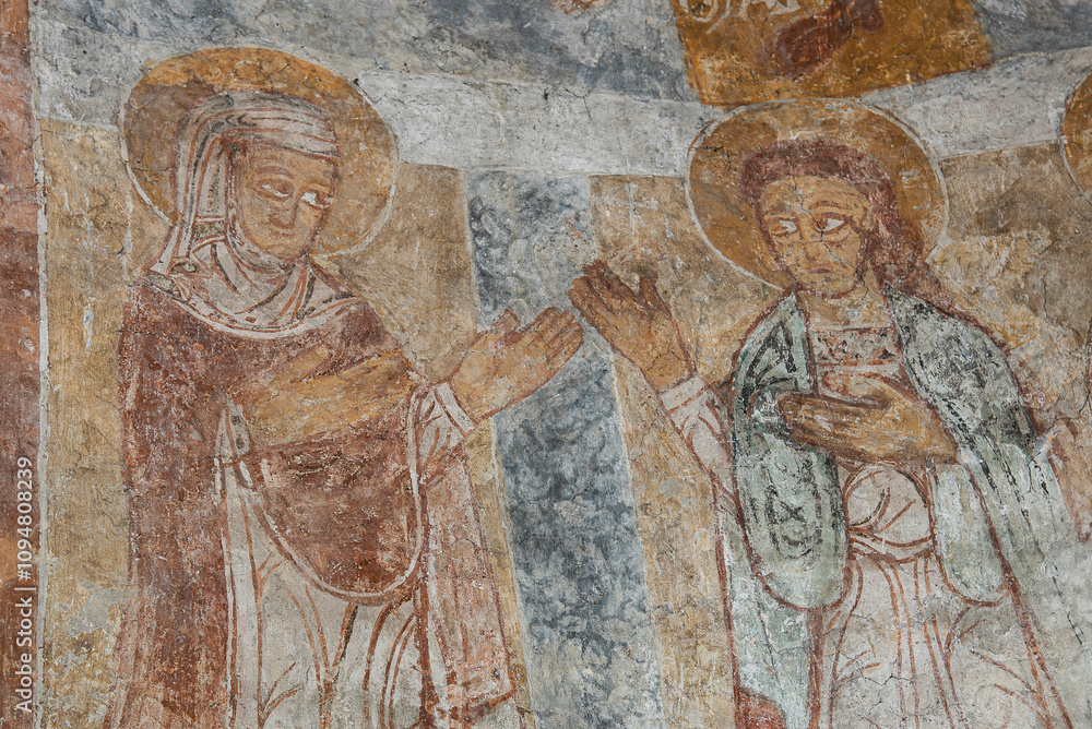 Romanesque fresco o f Virgin Mary and St. John