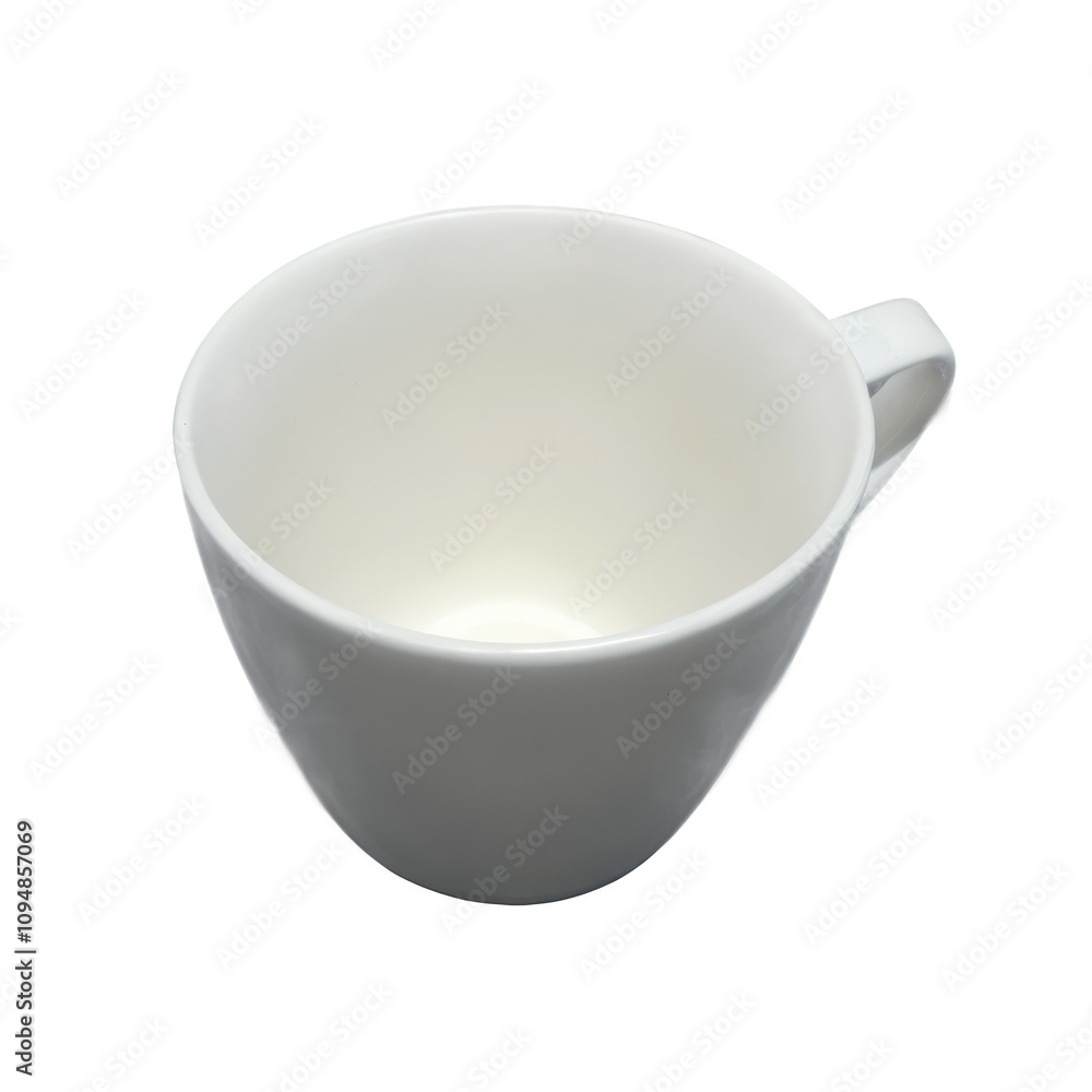 A white cup with a handle sits on a white background. Isolated on transparent background A white cup with a handle sits on a white background. Isolated on transparent background