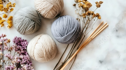 Yarn Balls Flowers and Knitting Needles Arranged Aesthetically