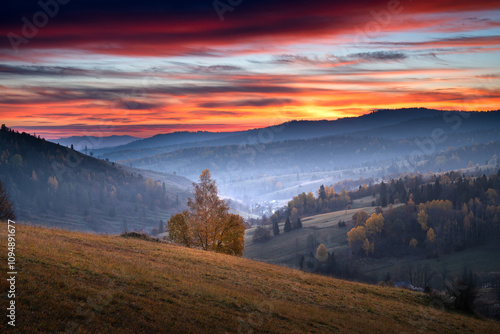 Sunrise Over Misty Mountain Valley