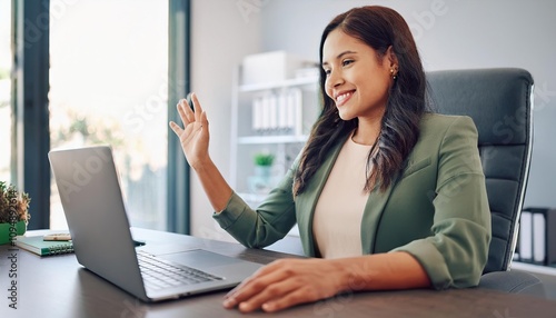 Remote hybrid work and telecommuting setup with businesswoman on laptop in a home office for virtual team collaboration photo