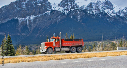 Heavy Cargo on the Road. A truck hauling freight along a highway. Taken in Alberta, Canada