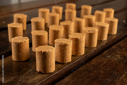 Sweet Brazilian Peanut Called Paçoca on a wooden desk