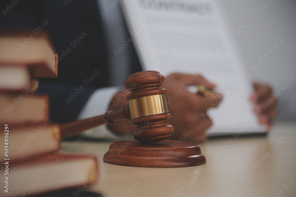 Law theme, gavel or mallet of the judge, lawyer enforcement officers, evidence-based cases taken into account in the court abount business, legislation. Law theme, gavel or mallet of the judge, lawyer enforcement officers, evidence-based cases taken into account in the court abount business, legislation.