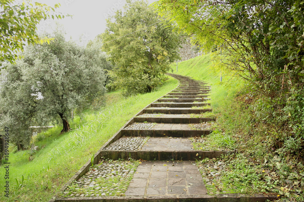 View of the steps leading to the Castle of Padenghe sul Garda, Brescia, Italy View of the steps leading to the Castle of Padenghe sul Garda, Brescia, Italy