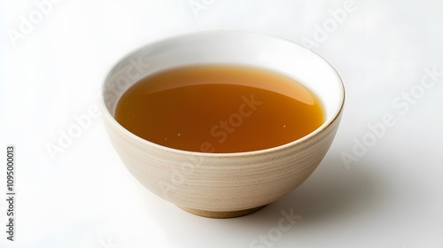 A warm bowl of herbal tea, showcasing its rich color and inviting appearance, perfect for a cozy and relaxing moment.