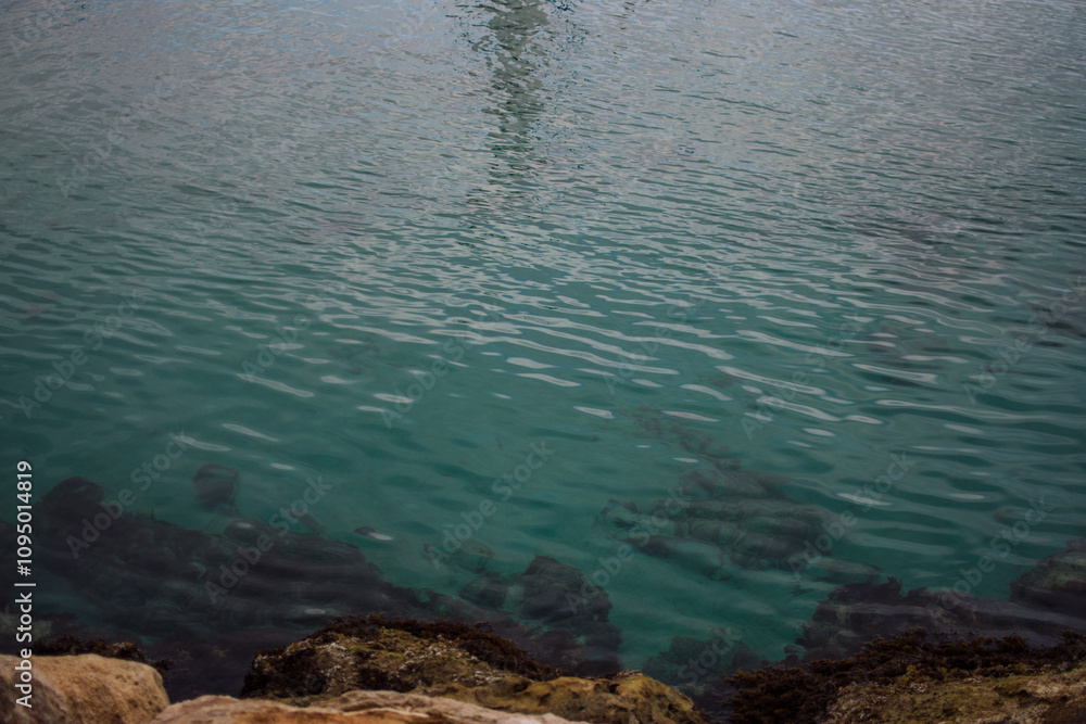 clear blue sea washes the shore clear blue sea washes the shore