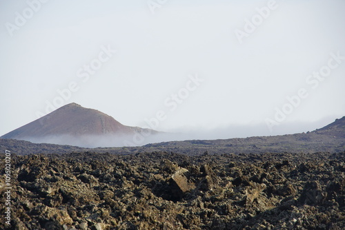 Fog, mist, morning trekking, volcanoes, lanzarote, volcanic island, canary islands, mountain, volcanic rocks, solids, lava, marsian landscape, november 2024 photo