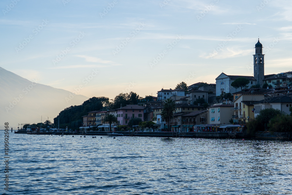 Limone Sul Garda, Italy - November 7, 2024: Landscape View of Lake Garda and mountains. Limone Sul Garda, Italy - November 7, 2024: Landscape View of Lake Garda and mountains.