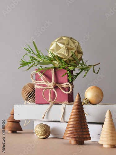 Creative still life with holiday decorations and gifts. Neutral background, copy space