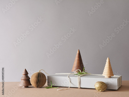 Creative still life with holiday decorations and gifts. Neutral background, copy space