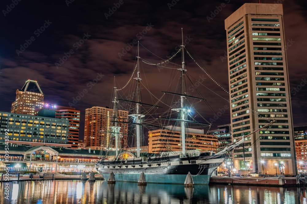Fototapeta premium The USS Constellation at Night, Inner Harbor, Baltimore MD USA