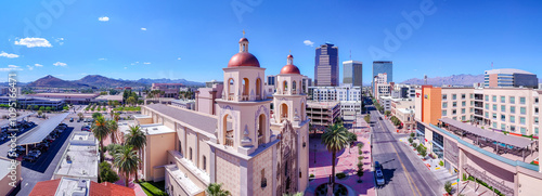 Tucson Arizona, USA: The old St. Augustine Cathedral in visual contrast against the corporate buildings of downtown.