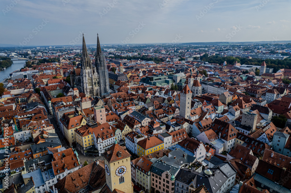 Obraz premium Beautiful aerial view of Regenesburg, its massive gothic St Peter cathedral, the Danube river and the Old Stone Bridge