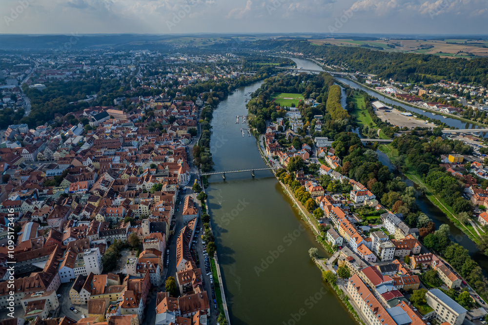 Obraz premium Beautiful aerial view of Regenesburg, its massive gothic St Peter cathedral, the Danube river and the Old Stone Bridge