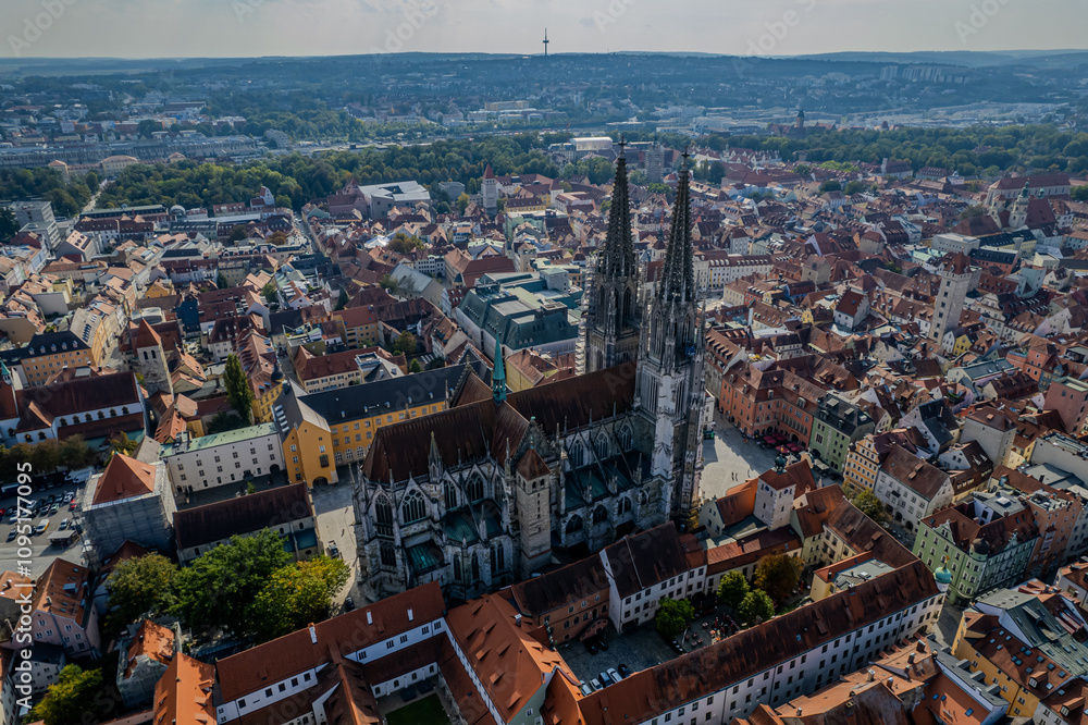 Obraz premium Beautiful aerial view of Regenesburg, its massive gothic St Peter cathedral, the Danube river and the Old Stone Bridge