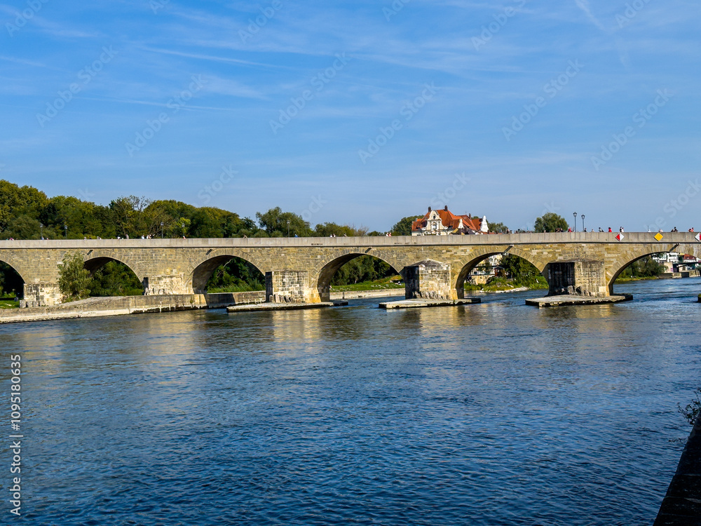 Beautiful aerial view of Regenesburg, its massive gothic St Peter cathedral, the Danube river and the Old Stone Bridge Beautiful aerial view of Regenesburg, its massive gothic St Peter cathedral, the Danube river and the Old Stone Bridge