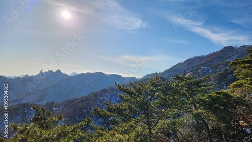 Image of winter scenery of Dobongsan Mountain near Seoul, Korea. Hiking in Dobosan. winter mountain landscapes. korea mountains. trekking. korean landscapes. bukhansan national park. photo