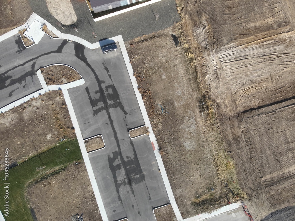 Obraz premium Aerial view showcasing the construction progress of a local subdivision