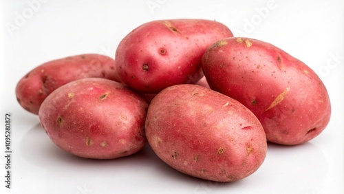 Raw red potatos isolated on white background photo