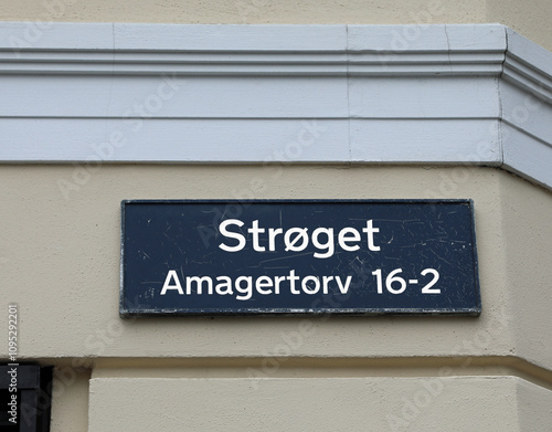 treet sign displaying the name of a very popular street in the city of copenhagen in denmark in europe photo