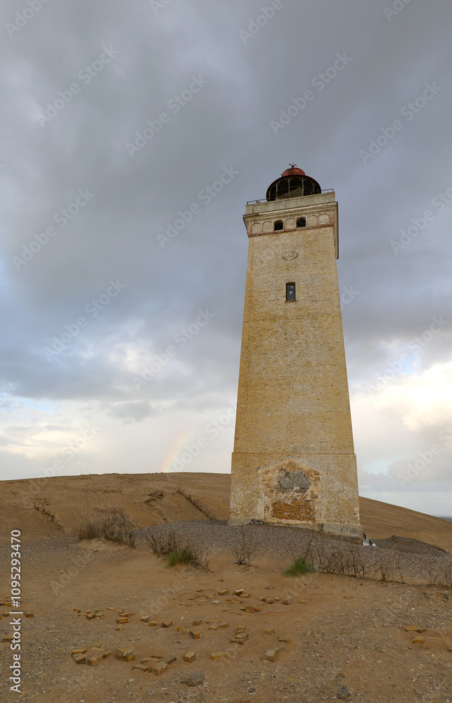 Abandoned lighthouse almost buried by sand in the Jutland peninsula in northern Denmark Abandoned lighthouse almost buried by sand in the Jutland peninsula in northern Denmark