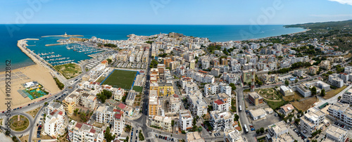 Panoramic aerial view of Vieste, in the province of Foggia, Puglia, Italy. It is a tourist resort in Gargano. It has a small tourist port and a beautiful historic center.