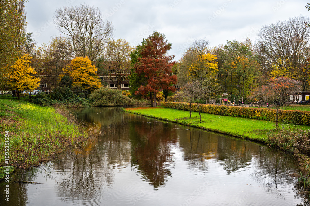 Colorful autumn reflections in the Erasmus park in Amsterdam, The Netherlands Colorful autumn reflections in the Erasmus park in Amsterdam, The Netherlands