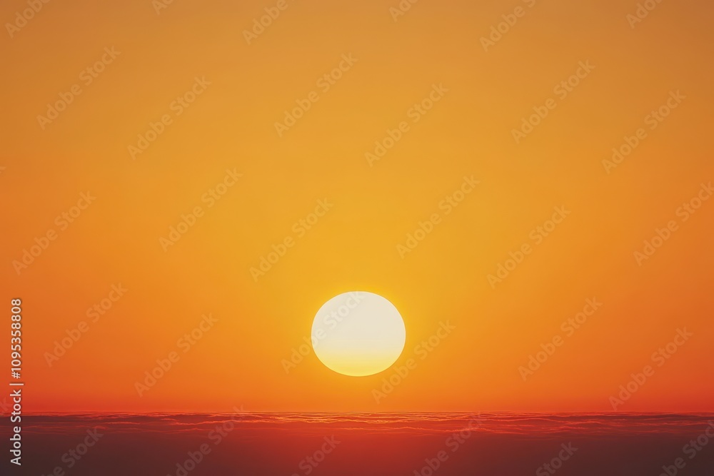Stunning sunset over calm ocean horizon with vibrant orange and yellow sky Stunning sunset over calm ocean horizon with vibrant orange and yellow sky