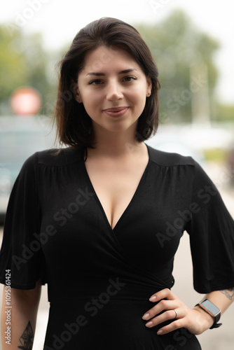 Portrait of a young beautiful dark-haired girl in an urban environment in summer. Free Download Portrait of a young beautiful dark-haired girl in an urban environment in summer. - GFXLoad