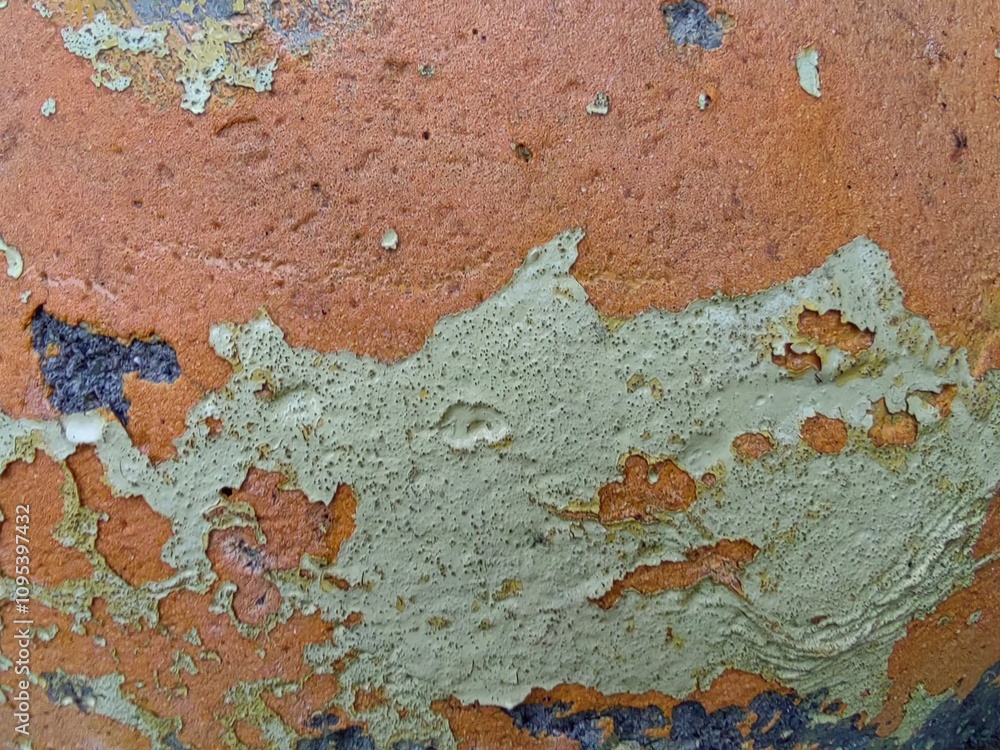 Texture, fragment of a wall with a jerking paint of orange, white, brown and yellow colors Texture, fragment of a wall with a jerking paint of orange, white, brown and yellow colors