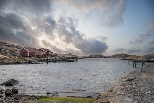 Harbor by the lake, landscape shot in autumn. Holiday village and harbor on the water in Sunnana Hamn in Sweden photo