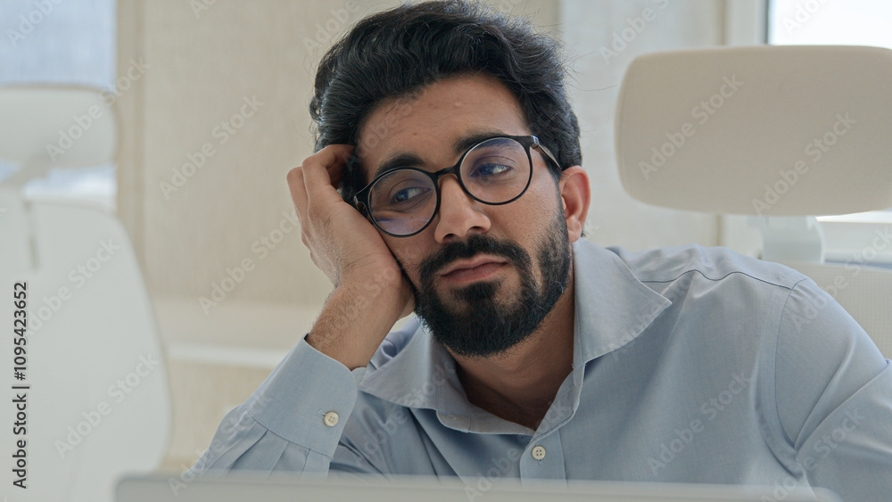 © Yuliia - Sleepy tired Arabian Indian man businessman lazy worker employee manager working boring online job in office feel depression burnout low energy apathy fatigued overwork unwell male guy with weariness © Yuliia - Sleepy tired Arabian Indian man businessman lazy worker employee manager working boring online job in office feel depression burnout low energy apathy fatigued overwork unwell male guy with weariness