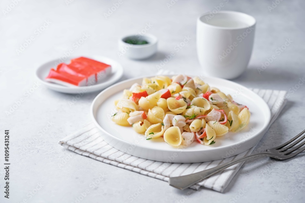Imitation crab sticks pasta in a plate Imitation crab sticks pasta in a plate