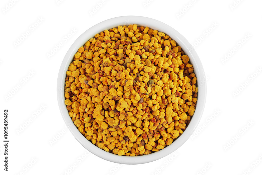 Bee pollen grains in ceramic bowl isolated on white background. Top view. Flat lay Bee pollen grains in ceramic bowl isolated on white background. Top view. Flat lay