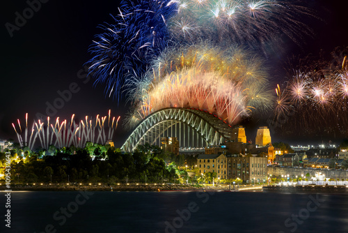 Canvas Print Sydney Harbour Bridge New Years Eve fireworks, colourful NYE fire works lighting the night skies with vivid multi colours NSW Australia
