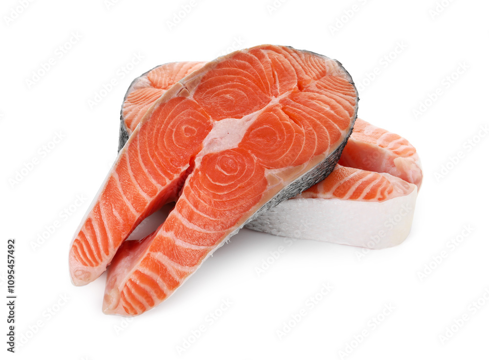 Steaks of fresh raw salmon isolated on white Steaks of fresh raw salmon isolated on white