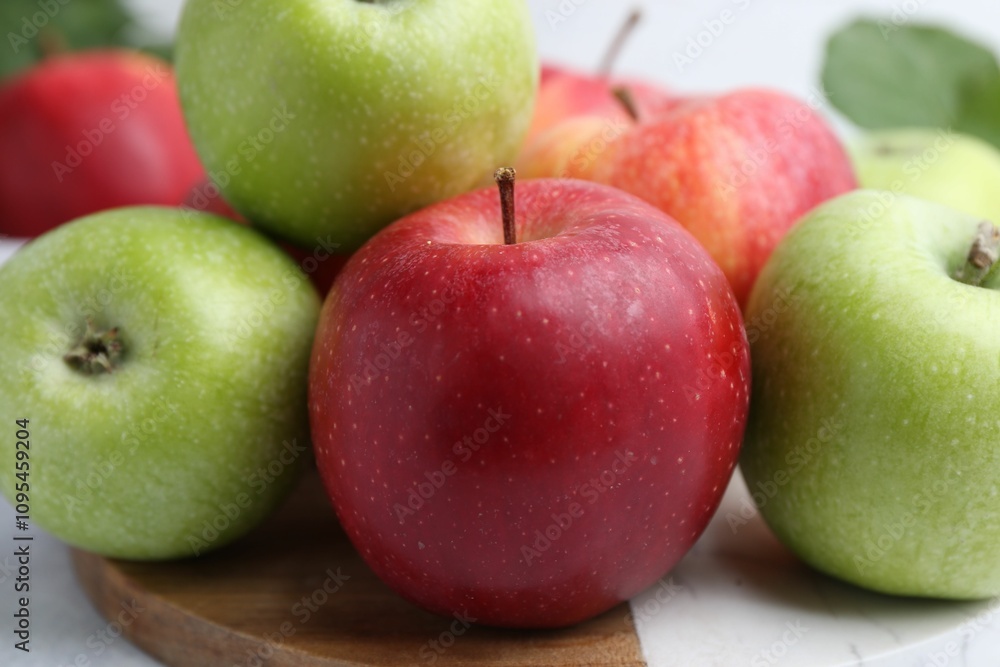 Many fresh ripe apples on table, closeup Many fresh ripe apples on table, closeup
