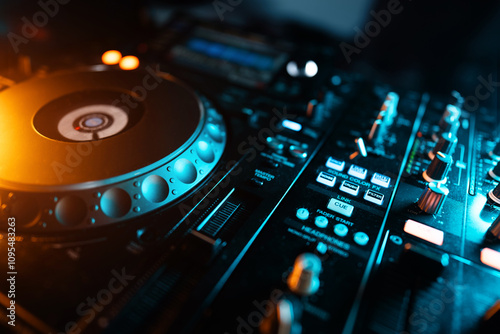 Tableau sur toile closeup of professional digital pioneer dj decks and audio mixer equipment ready