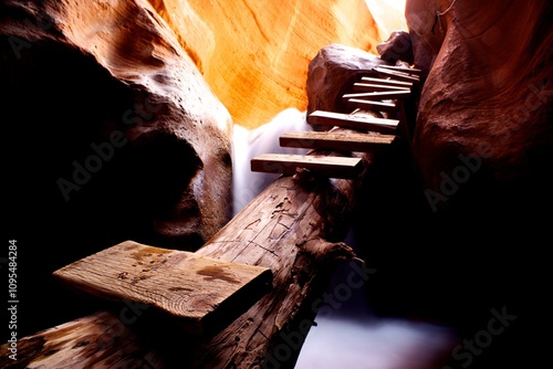 Εκτύπωση καμβά Log bridge and ladder leading out of red rock chasm