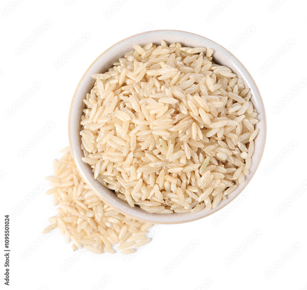 Raw rice in bowl isolated on white, top view Raw rice in bowl isolated on white, top view