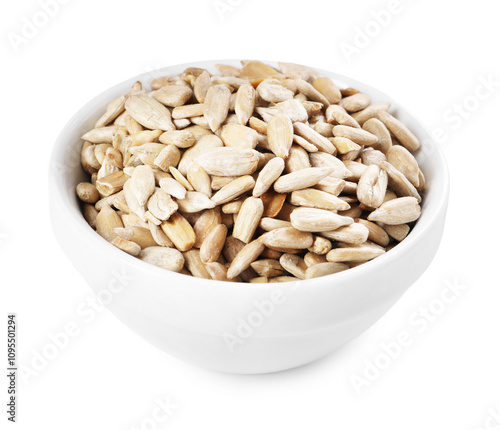 Peeled sunflower seeds in bowl isolated on white