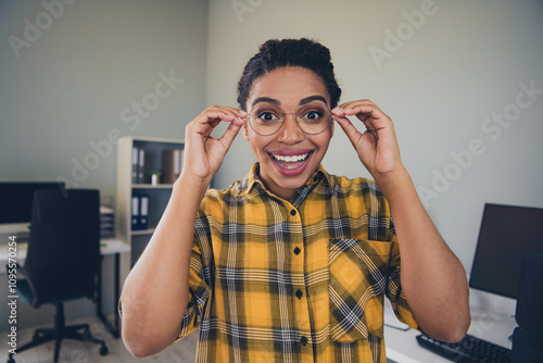 Wallpaper Mural Photo of attractive young woman touch spectacles excited wear yellow plaid shirt comfortable modern office room interior indoors workspace Torontodigital.ca