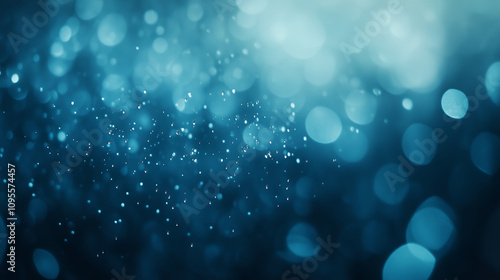 Blue bokeh background with water droplets and soft light effects 